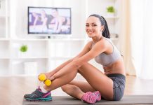 Fit woman does home workouts