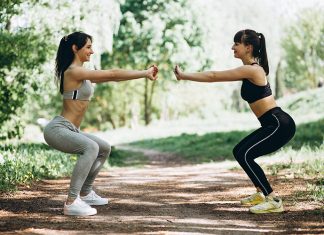 Two fit women warming up-cooling down