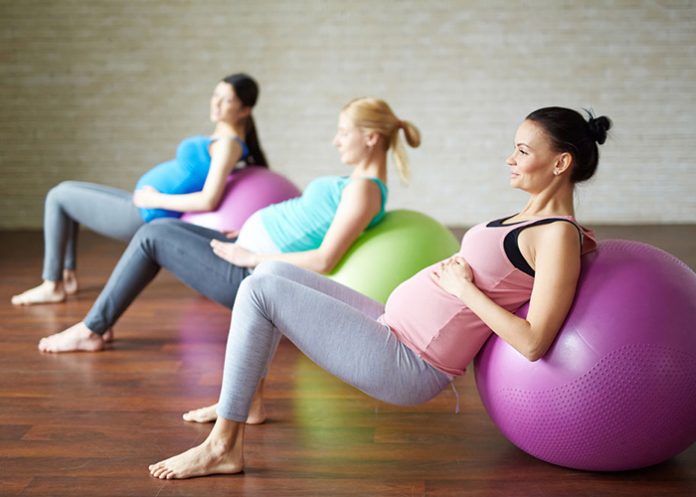 Pregnant women exercising