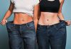 Two fit women in loose jeans